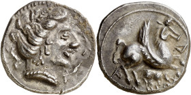 Iltirtar. Dracma ibérica de imitación emporitana. (FAB. 1160) (ACIP. 346) (A.N. 36, pág. 43, nº 6, mismo ejemplar). Anv.: Cabeza femenina, dos delfine...