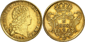 * Portugal. 1729. Juan V. Lisboa. 1 dobra (12800 reis). (Fr. 84) (KM. 222.6) (Gomes 134.06). Leves marquitas. Bella. Rara. AU. 28,45 g. EBC. Moneda ex...