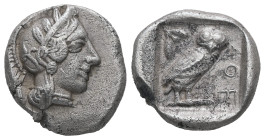 Attica, Athens. AR Drachm. 4.06 g. - 16.35 mm. Circa 454-404 BC.
Obv.: Helmeted head of Athena right.
Rev.: AΘE, Owl standing right, head facing; oliv...