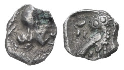 Attica, Athens. AR Hemiobol, 0.28 g 6.74 mm. Possibly an eastern imitation. Circa 400/390-294 BC. 
Obv: Helmeted head of Athena right, with frontal ey...