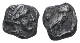 Attica, Athens. AR, Obol. 0.78 g. - 8.46 mm. Circa 454-404 BC.
Obv.: Head of Athena right, with frontal eye; wearing crested Attic helmet decorated wi...