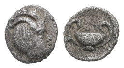 Asia Minor, uncertain. AR Hemiobol. 0.22 g. - 6.51 mm. 4th century BC.
Obv.: Horned head of Pan right, with African features.
Rev.: Kylix in incuse ci...