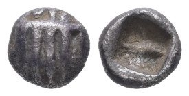 Asia Minor, uncertain. AR Hemiobol. 0.27 g. - 6.02 mm. 5th-4th Century BC.
Obv.: Facing stylized head of a lion with spiky mane.
Rev.: Incuse square p...