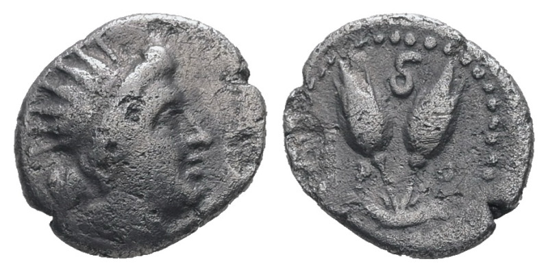 Caria, Rhodes. AR Diobol, 0.80 g 10.41 mm. Circa 205-190 BC.
Obv: Radiate head o...