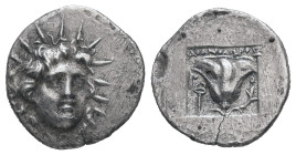 Caria, Rhodos. AR, Drachm. 1.21 g. - 13.98 mm. Circa 170-150 BC. 'Plinthophoric' coinage, Athanodoros, magistrate.
Obv.: Radiate head of Helios facing...