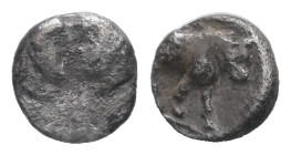 Caria, Uncertain mint. AR Tetartemorion ? 0.17 g 5.97 mm. Circa 500-450 BC. 
Obv: Two youthful male heads confronted. 
Rev: Bull advancing to right. 
...