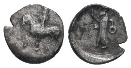 Cilicia, Uncertain. AR Hemiobol, 0.38 g 9.26 mm. 4th century BC. 
Obv: Horseman to left, wearing satrapal headdress and holding scepter (?) in his lef...