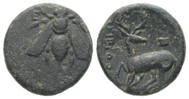 Ionia, Ephesos. AE. 2.83 g. - 15.95 mm. ca. 4th century BC. Uncertain magistrate.
Obv.: Ε - Φ. Bee.
Rev.: Stag kneeling left, head right; astragalos a...