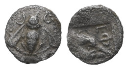 Ionia, Ephesos. AR, Tetartemorion. 0.16 g. - 7.03 mm. Circa 500-420 BC.
Obv.: Bee with slightly curved wings; annulet to left and right.
Rev.: Ε Φ, He...