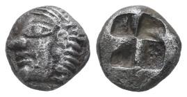 Ionia, Kolophon. AR Obol, 1.04 g 8.71 mm. Late 6th century BC.
Obv.: Archaic male head (of Apollo?) left.
Rev.: Quadripartite incuse square.
Ref.: SNG...