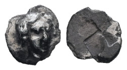 Ionia, Kolophon. AR Tetartemorion, 0.14 g 6.62 mm. Circa 450-410 BC.
Obv: Head of Apollo with waved hair, slightly right.
Rev: Quadripartite incuse sq...