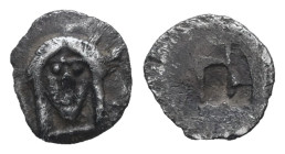 Ionia, Kolophon. AR Tetartemorion, 0.19 g 7.18 mm. Circa 450-410 BC.
Obv: Head of Apollo wearing laurel wreath.
Rev: Monogram of TE within incuse squa...