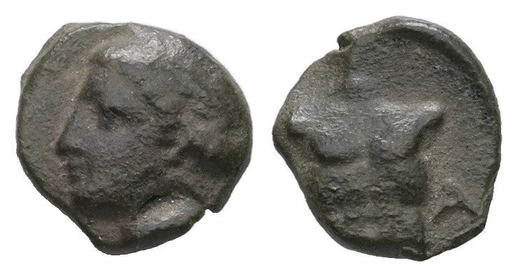 Ionia, Magnesia ad Maeandrum. Ae, 0.43 g 8.12 mm. Circa 400 BC
Obv: Laureate hea...