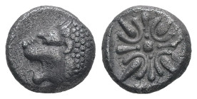 Ionia, Miletos. AR Obol or Hemihekte, 1.09 g 8.97 mm. Late 6th-early 5th centuries BC.
Obv: Forepart of lion right, head left.
Rev: Stellate floral de...