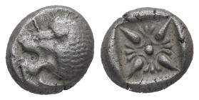 Ionia, Miletos. AR Obol or Hemihekte, 1.13 g 9.24 mm. Late 6th-early 5th centuries BC.
Obv: Forepart of lion right, head left.
Rev: Stellate floral de...