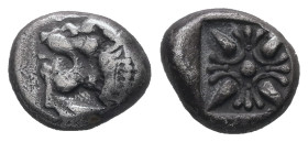 Ionia, Miletos. AR Obol or Hemihekte, 1.18 g 9.32 mm. Late 6th-early 5th centuries BC.
Obv: Forepart of lion right, head left.
Rev: Stellate floral de...