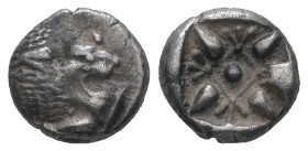 Ionia, Miletos. AR, Obol or Hemihekte. 1.22 g 9.63 mm. Late 6th-early 5th centuries BC.
Obv.: Forepart of lion left, head right.
Rev.: Stellate floral...