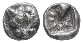 Ionia, Miletos. AR, Obol. 0.75 g. - 8.12 mm. Late 6th-early 5th centuries BC.
Obv.: Facing head of lion or panther.
Rev.: Stellate floral pattern with...