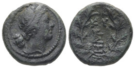 Mysia, Kyzikos. AE. 5.15 g. - 18.18 mm. 2nd-1st centuries BC.
Obv: Head of Kore to right, wearing wreath of corn.
Rev: ΚΥ-ΣΙ above and below monogram ...