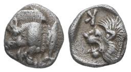 Mysia, Kyzikos. AR Obol, 0.76 g 9.27 mm. Circa 450-400 BC.
Obv.: Forepart of boar left; tunny to right.
Rev.: Head of roaring lion left; retrograde K ...