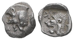 Mysia, Kyzikos. AR Obol, 0.77 g 10.55 mm. Circa 450-400 BC.
Obv.: Forepart of boar left; tunny to right.
Rev.: Head of roaring lion left; retrograde K...