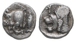 Mysia, Kyzikos. AR Obol, 0.83 g 9.17 mm. Circa 450-400 BC.
Obv.: Forepart of boar left; tunny to right.
Rev.: Head of roaring lion left; retrograde K ...