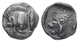 Mysia, Kyzikos. AR Obol. 0.80 g. - 9.93 mm. Circa 450-400 BC.
Obv.: Forepart of boar left; to right, tunny upward.
Rev.: Head of roaring lion left wit...