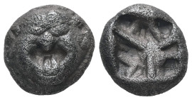 Mysia, Parion. AR Drachm, 3.76 g. – 12.82 mm. 5th century BC.
Obv.: Facing gorgoneion with protruding tongue.
Rev.: Disorganized linear pattern within...