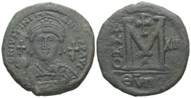 Justinian I, AD 527-565. AE, Follis. 21.53 g. 38.73 mm. Theoupolis (Antiochia).
Obv: D N IVSTINI - ANVS P P AVI. Frontal bust of Justinian I wearing ...