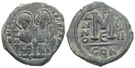 Justin II and Sophia. AD 565-578. AE, Follis. 13.51 g. 30.94 mm. Constantinople.
Obv: DNI[VSTI-NV]SPP[AVC]. Justin II on left and Sophia on right, sea...
