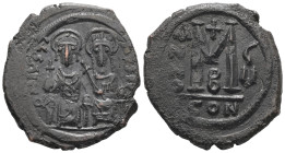 Justin II and Sophia. AD 565-578. AE, Follis. 13.74 g. 32.14 mm. Constantinople.
Obv: DNIVSTI-NVSPP[AVC]. Justin II on left and Sophia on right, seate...