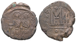 Justin II and Sophia. AD 565-578. AE, Follis. 15.56 g. 29.66 mm. Constantinople.
Obv: [DNIVSTI]-NVSPP[AVC]. Justin II on left and Sophia on right, sea...