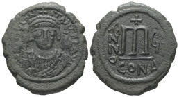 Tiberius II Constantine, AD 578-582. AE, Follis. 13.35 g. 32.06 mm. Constantinople.
Obv: [D m TIB] CON-TANT P P AVG. Frontal bust of Tiberius II Const...