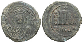 Tiberius II Constantine, AD 578-582. AE, Follis. 12.89 g. 29.10 mm. Constantinople.
Obv: D m TIB CO[NS]-TAN P P A[VG]. Frontal bust of Tiberius II Con...