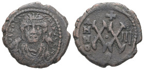 Maurice Tiberius, AD 582-602. AE, Half Follis. 6.12 g. 23.41 mm. Theoupolis (Antioch). 
Obv: Frontal bust of Maurice wearing loros and crown with cros...