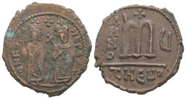 Phocas and Leontia, AD 602-610. AE, Follis. 9.78 g. 29.46 mm. Theoupolis (Antioch).
Obv: DN FOCA NЄ PЄ AV. Phocas standing to left, crowned and holdin...