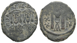 Michael I and Theophilus, AD 811-813. AE, Follis. 5.26 g. 22.48 mm. Constantinople.
Obv: mIXAHL-SΘ-EOFIL. Crowned busts facing of Michael with short b...