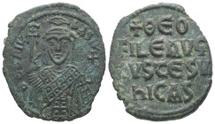 Theophilus, AD 829-842. AE, Follis. 7.87 g. 28.01 mm. Constantinople.
Obv: Θ[EO]FIL-bASIL. Crowned, three-quarter length figure of Theophilus facing, ...