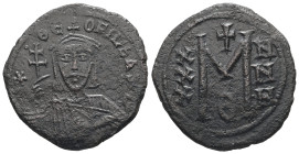 Theophilus, AD 829-842. AE, Follis. 7.77 g. 28.94 mm. Constantinople.
Obv: ✷ΘE-OFILbA[SIL]. Crowned, three-quarter length figure of Theophilus facing,...