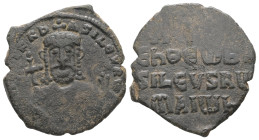 Nicephorus II Phocas, AD 963-969. AE, Follis. 5.11 g. 25.53 mm. Constantinople.
Obv: [nIC]IFR b-ASILEV RW. Crowned bust facing, holding labarum and gl...