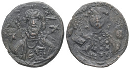 Michael VII Ducas, AD 1071-1078. AE, Follis. 4.98 g. 26.39 mm. Constantinople.
Obv: Frontal bust of Christ bearded, with cross behind head, wearing tu...