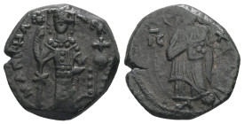 Manuel I Comnenus, AD 1143-1180. AE, Tetarteron. 3.23 g. 18.58 mm. Constantinople.
Obv: IC-XC. Christ nimbate, standing facing on footstool, wearing p...