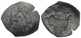 Michael VIII Palaeologus, AD 1261-1282. AE, Trachy. 2.18 g. 25.01 mm. Constantinople.
Obv: The Archangel Michael, nimbate and winged, standing facing....