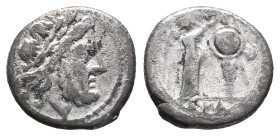 Anonymous, Rome, after 218 BC. AR Victoriatus (17mm, 3.11g). Laureate head of Jupiter r. R/ Victory standing r., crowning trophy. Crawford 44/1. Fine