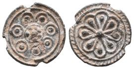 Medieval PB Tessera (22mm, 3.94g). Central star; seven pellet-in-circle around. R/ Rosette. VF