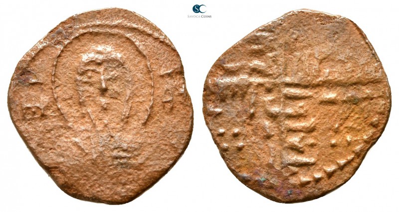 Ruggero II AD 1105-1154. Bari
Frazione di Follaro AE

14 mm.,0,76 g.



v...