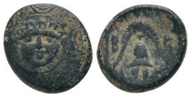 KINGS OF MACEDON, Philip III Arrhidaios (Circa 323-317 BC) AE Obv: Macedonian shield, with facing gorgoneion on boss. Rev: B-A. Helmet; double axe to ...