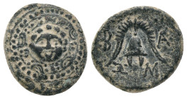 KINGS OF MACEDON, Philip III Arrhidaios (Circa 323-317 BC) AE Obv: Macedonian shield, with facing gorgoneion on boss. Rev: B-A. Helmet; double axe to ...