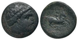 KINGS OF MACEDON. Philip II. (359-336 BC). AE Uncertain mint in Macedon. Obv: Head of Apollo wearing taenia right Rev: ΦΙΛΙΠΠΟΥ. Philip on horseback p...