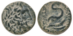MYSIA. Pergamon. (Mid-late 2nd century BC). AE Obv: Laureate head of Asklepios right.
Rev: ΑΣΚΛΕΠΙΟΥ / ΣΩΤΗΡΟΣ. Serpent coiled right around omphalos....